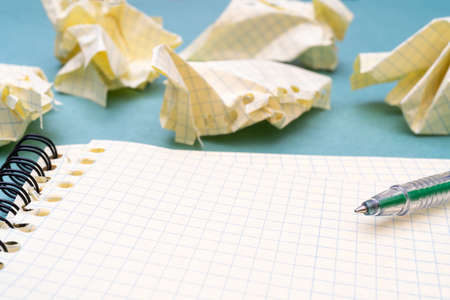 Green fountain pen and notepad pages. Preparing for scholarship and education. The torment of creativity.の写真素材