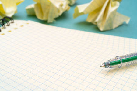 Green fountain pen and notepad pages. Preparing for scholarship and education. The torment of creativity.の写真素材