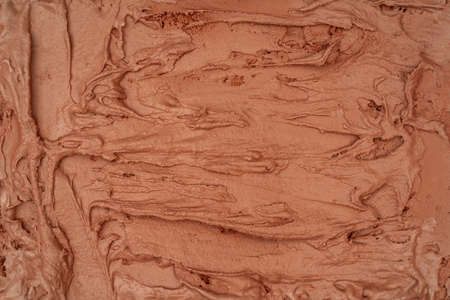 Chocolate ice cream texture. Top view. Delicious cool treat.の写真素材