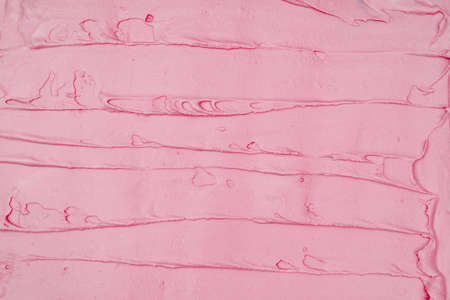 Strawberry ice cream texture. Top view. Delicious cool treat.の写真素材