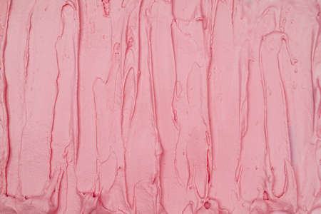 Strawberry ice cream texture. Top view. Delicious cool treat.の写真素材