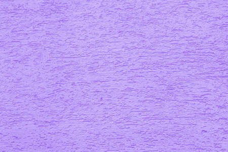 Violet plaster wall of a building. Rough surface texture.の写真素材