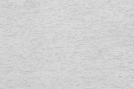 White plaster wall of a building. Rough surface texture.の写真素材