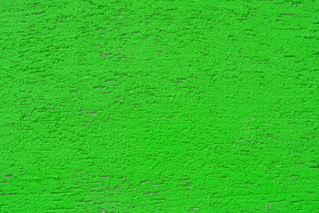 Pink plaster wall of a building. Rough surface texture.の写真素材