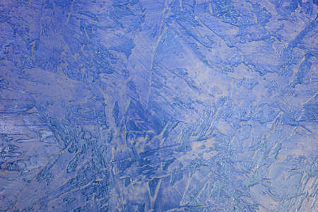 Texture of blue plaster. Rough wall of the building.の写真素材