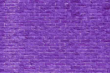 Violet brick building wall. Interior of a modern loft. Background for design.の写真素材