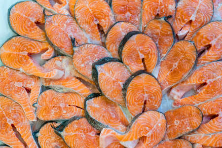 Fresh salmon steaks. Selling seafood in a supermarket.の写真素材
