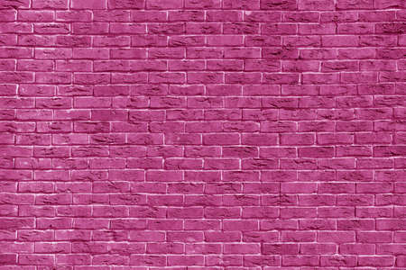 Pink brick building wall. Interior of a modern loft. Background for designの写真素材