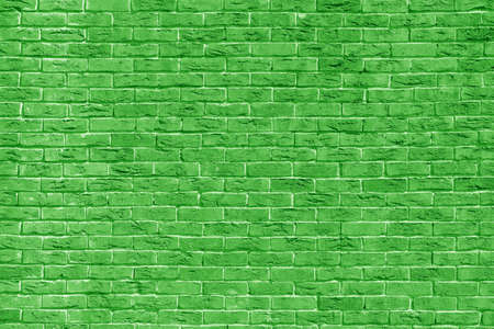 Green brick building wall. Interior of a modern loft. Background for design.の写真素材