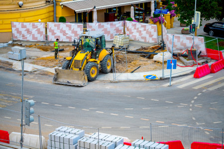 Moscow. Russia. July 31 2021. Tractor repairs a street in the city.