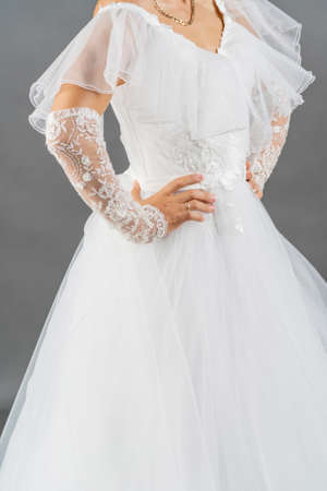 White dress of the bride. Light fabric texture. Traditional wedding wear.の写真素材