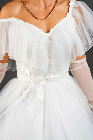 White dress of the bride. Light fabric texture. Traditional wedding wear.の写真素材