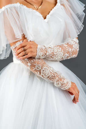White dress of the bride. Light fabric texture. Traditional wedding wear.の写真素材