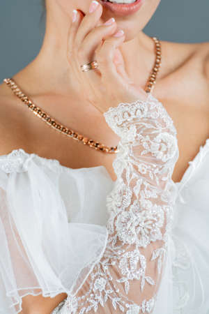White dress of the bride. Light fabric texture. Traditional wedding wear.の写真素材