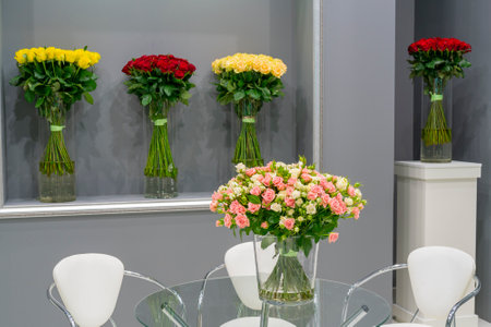 Bouquet of beautiful red roses on the table. Floral festive natural background.の写真素材