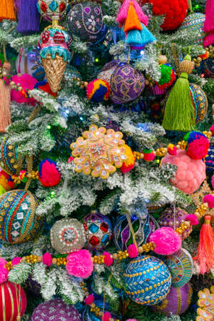 A festively decorated Christmas tree. Bright festive background.の写真素材