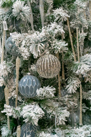 A festively decorated Christmas tree. Bright festive background.の写真素材