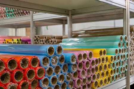 Rolls of colored wrapping paper. Abstract economic background.の写真素材