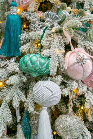 A festively decorated Christmas tree. Bright festive background.の写真素材