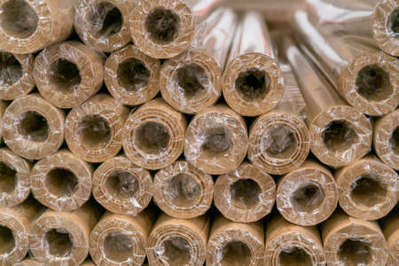 Rolls of colored wrapping paper. Abstract economic background.の写真素材