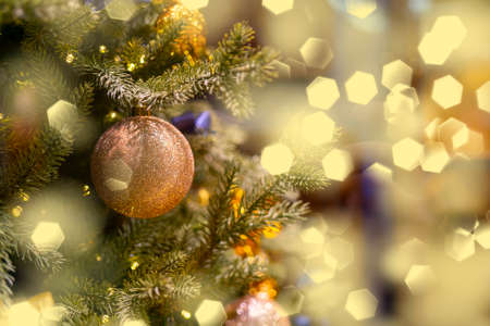 Holiday decorations for the Christmas tree. Blurred holiday background.の写真素材