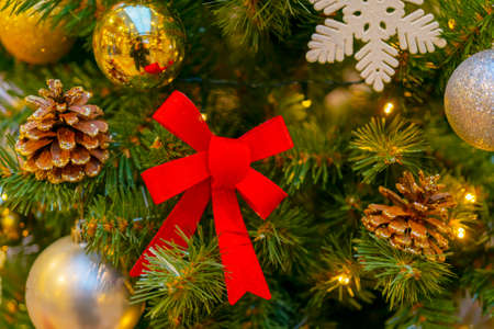 Holiday decorations for the Christmas tree. Blurred holiday background.の写真素材