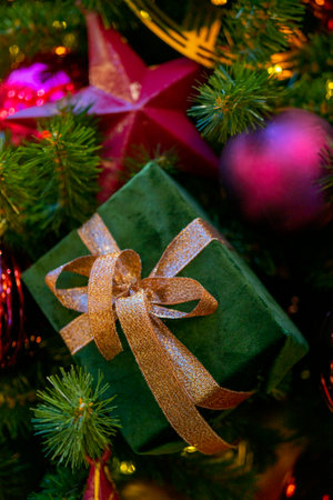 Holiday decorations for the Christmas tree. Blurred holiday background.の写真素材