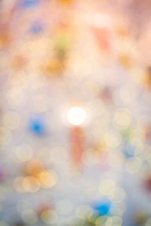 Beautiful bokeh effect. Blurred bright festive Christmas background.
