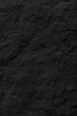 Texture of black rough stone. Natural beautiful surface.の写真素材