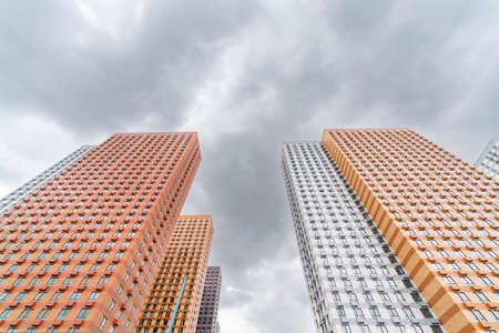 Moscow. Russia. April 26 2022. Modern beautiful multi-storey residential building skyscraper. Sale...