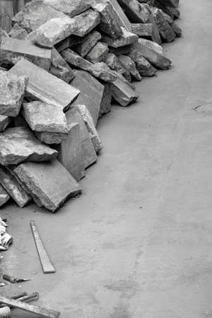 Shards of gray stone. Remains of a destroyed building.の写真素材