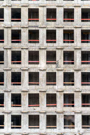 Facade of a house under construction. modern building industry. Sale and rental of real estate.の写真素材