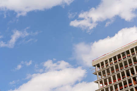 Facade of a modern skyscraper. active construction industry. Sale and rental of real estate.の写真素材