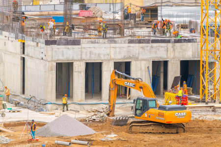 2022 01 May. Moscow. Russia. Construction workers at the construction site Modern construction...