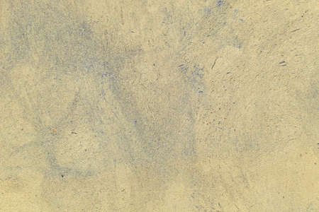 The texture of the old cracked blue plaster. Construction vintage background.の写真素材
