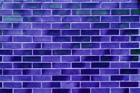 Brick wall of the building. Designer building background.の写真素材