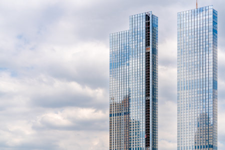 Glass facade of a modern building. Construction and rental housing.の写真素材