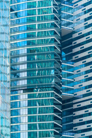 Glass facade of a modern building. Construction and rental housing.の写真素材