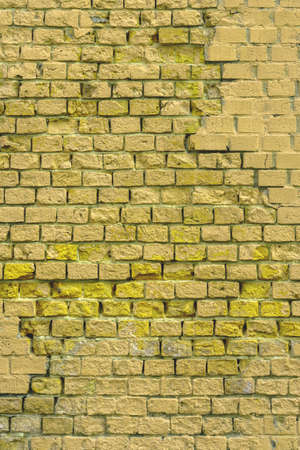 Brick wall of the building. Designer building background.の写真素材