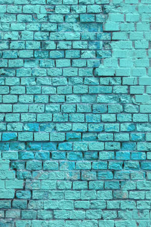 Brick wall of the building. Designer building background.の写真素材