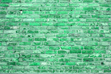 Brick wall of the building. Designer building background.の写真素材
