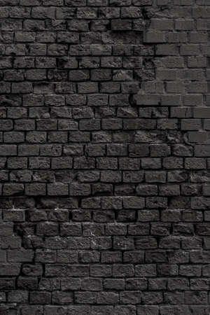 Brick wall of the building. Designer building background.の写真素材