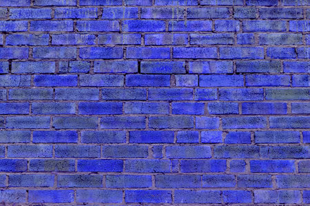 Brick wall of the building. Designer building background.の写真素材