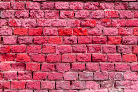 Brick wall of the building. Designer building background.の写真素材