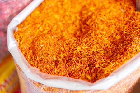 A bag of orange spice is shownの写真素材