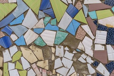 Mosaic of multicolored pieces of broken tiles. Abstract artistic background.の写真素材