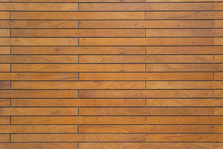 Wooden wall made of timber. Designer decorative background.の写真素材