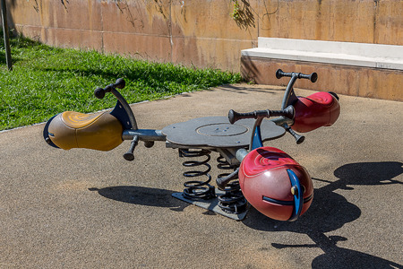 Children Playground on a Sunny Day Near Some Trees