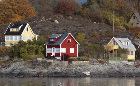 Cottage near the fjordの写真素材