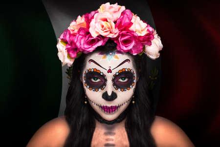 Young Mexican woman made up as a catrina on the occasion of the Day of the Dead.
